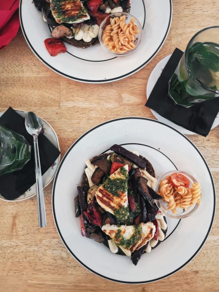 Two brunch plates on a wooden table