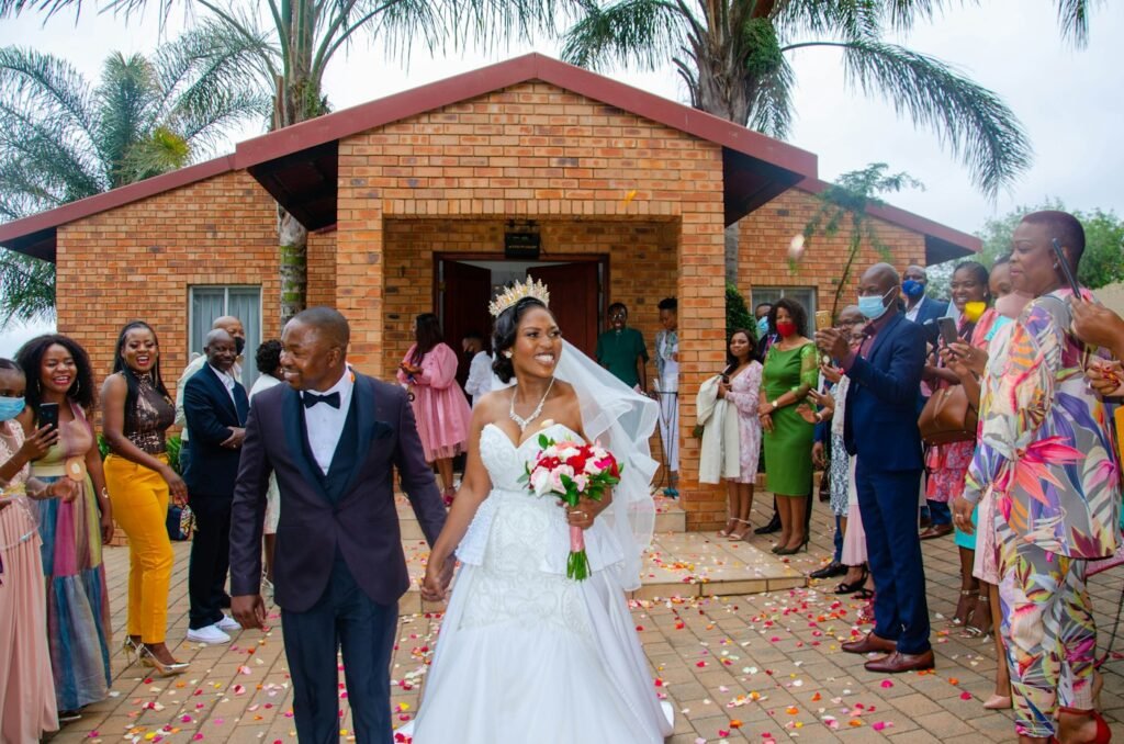 Bride and groom walking out after their ceremony