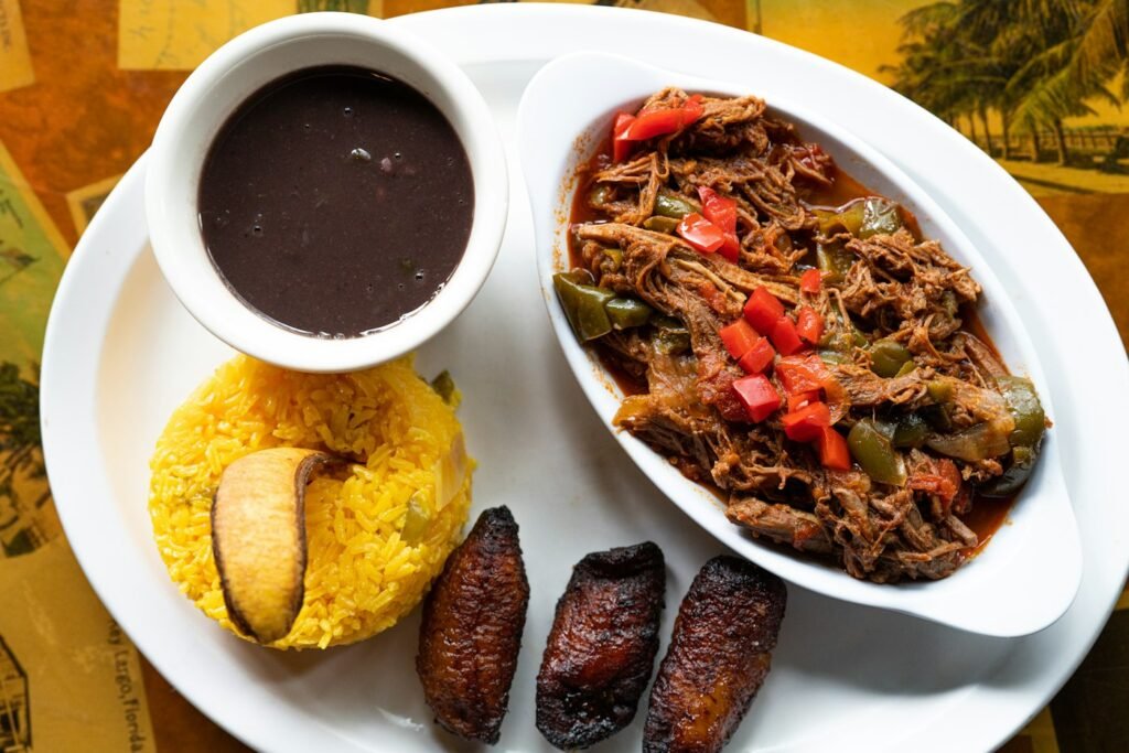 Plate of Caribbean-style rice, plantain and stew