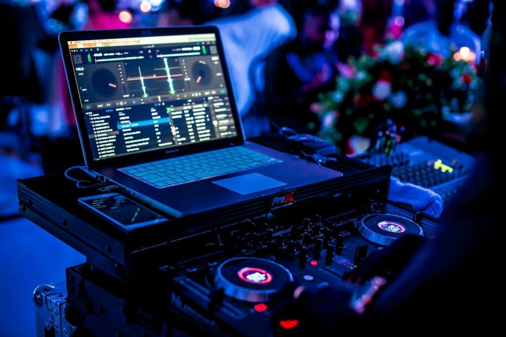 DJ mixer and laptop set up for a party