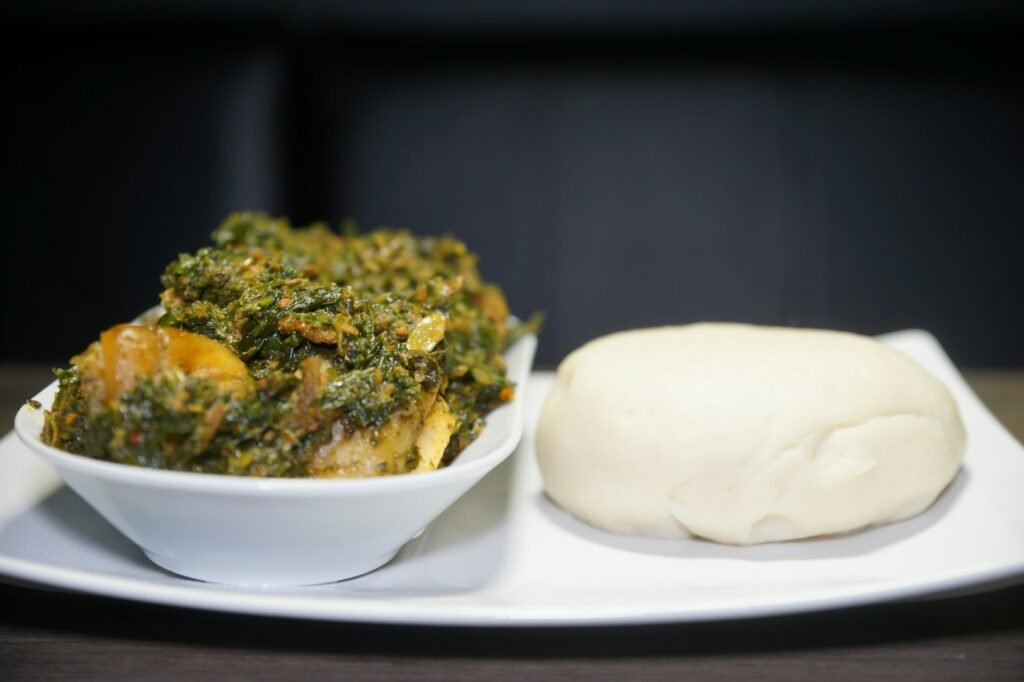 Vegetable stew with a side of swallow