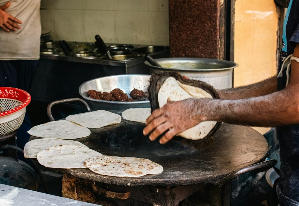 Flatbread cooking on a large griddle