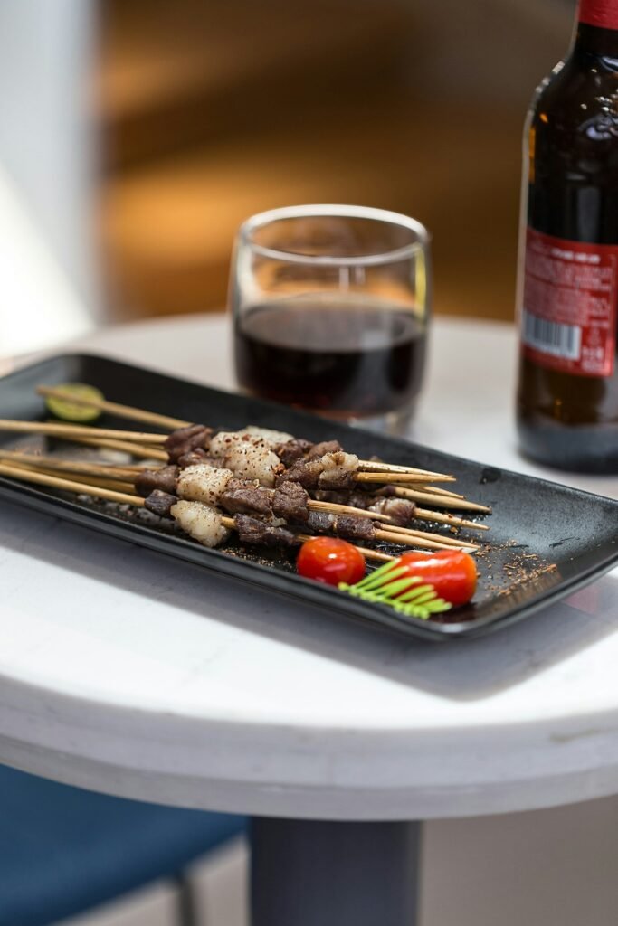 Grilled meat skewers on a plate